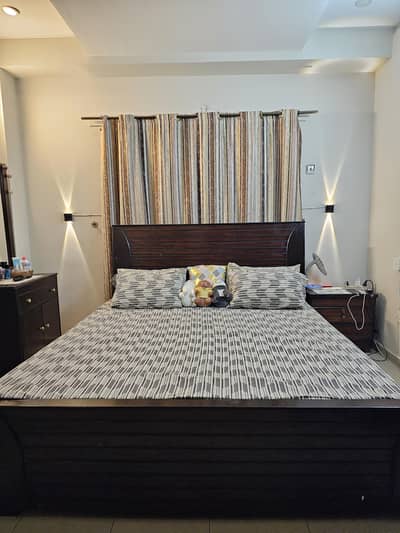 Wooden king sized bed (without side tables)