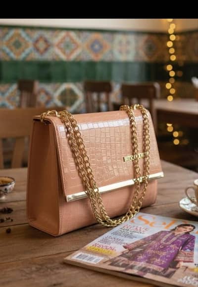 Branded hand begs & purse