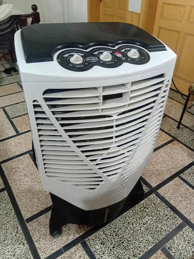 Air coller for sale with 4 ice bags & water pump motor working .