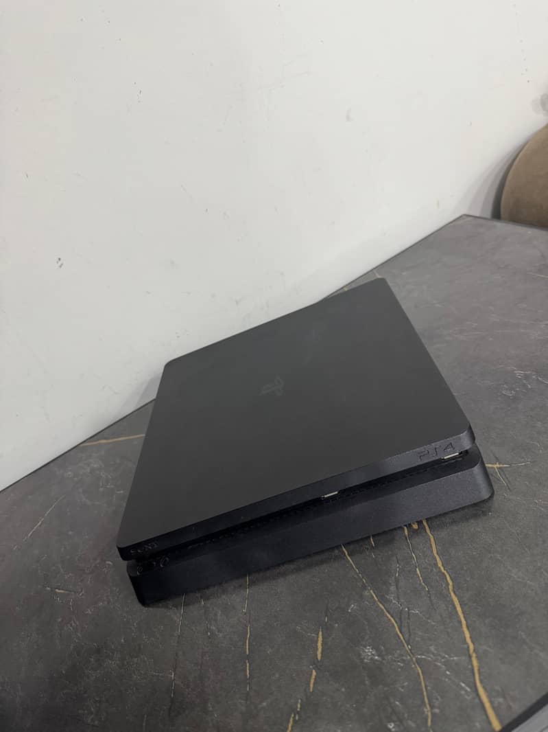 PS4 SLIM 1TB 7
