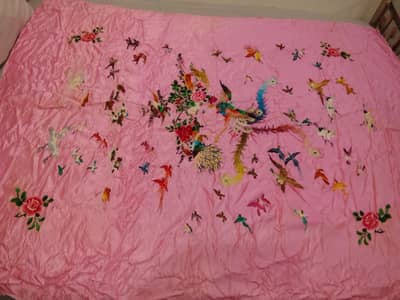 it's a rashmi romal made with machine karaii and it's size 5 by 6