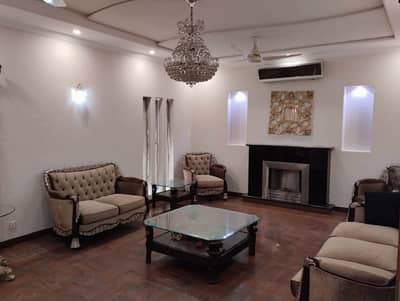 1 KANAL ELEGANT AND FULLY MAINTAINED SUPER HOT LOCATED BUNGALOW On MAIN'S BACK IS AVAILABLE IN THE BEST BLOCK OF DHA LAHORE.