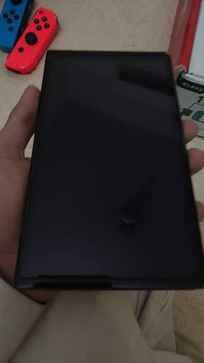 Nintendo Switch V2 with Accessories & Games