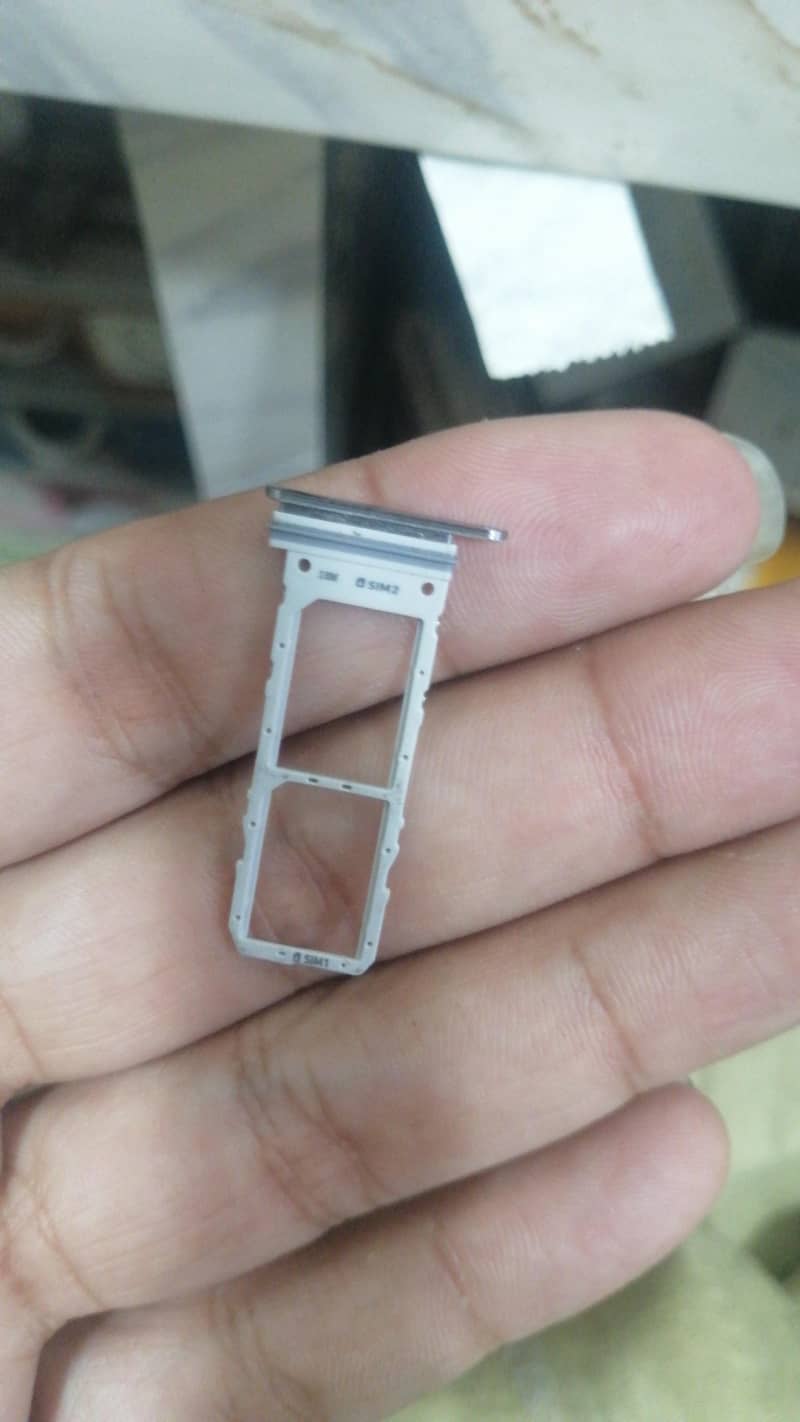 sim tray 0