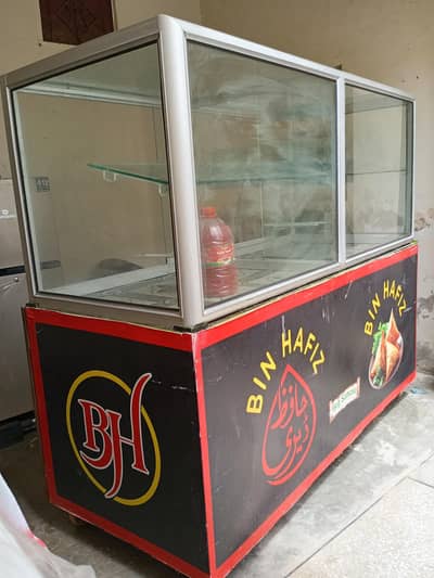 samosa, goolgapy, milkshake, juice shop display counter