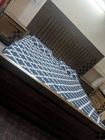 King size bed with side tables and dressing table