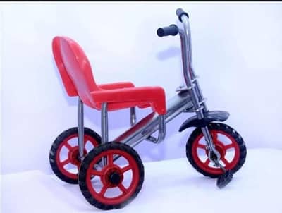 Red kids tricycle with 3 wheels and fiber plastiic frame. 0303599375 no