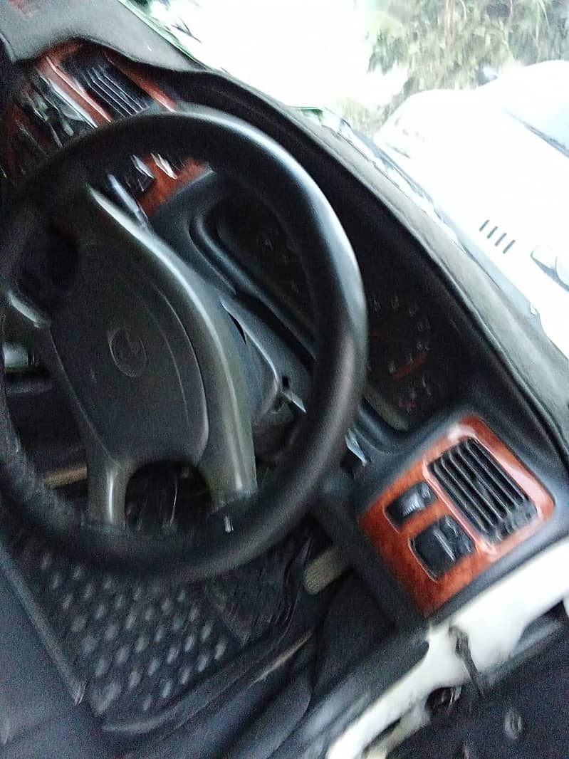 Corolla Indus 1.5 9