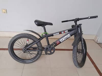 bmx style cycel for sale with carrier