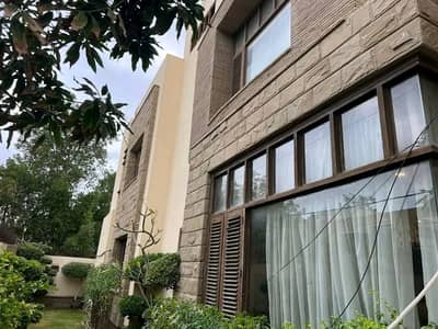 WELL-MAINTAINED 500 SQ YD 6-BEDROOM BUNGALOW WITH BASEMENT FOR RENT IN DHA PHASE 6, KARACHI