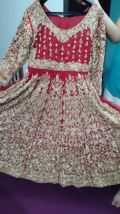Bridal dress in anari red color