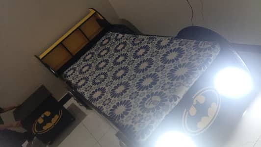 bad with mattress side table
