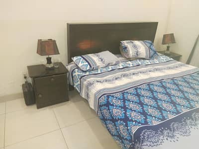 Bed with dressing table
