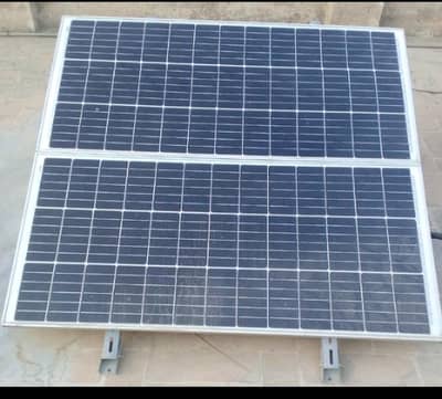 Two solar plates of 150 watt original with stand for sale