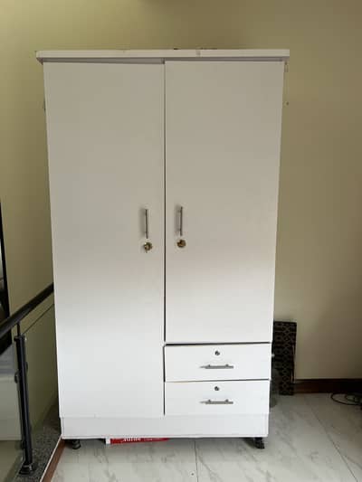 Spacious Wooden Wardrobe with Lock & Wheels – Used (7/10 Condition)
