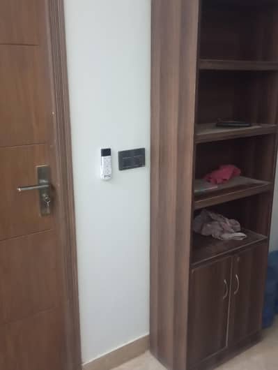 Modern 4-tier wooden bookshelf with bottom cupboard