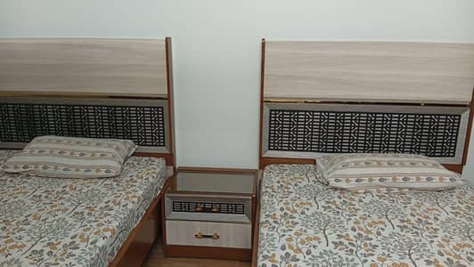 wooden bed with 1 side table