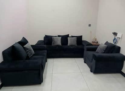 Deep black velvet sofa set