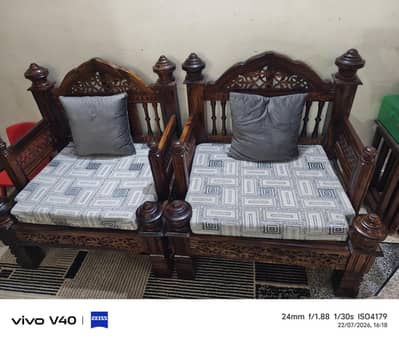 wooden sofa and 2 chairs