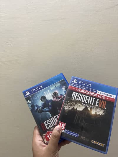 Resident evil 2 remake and Resident evil 7 re7 ps4 game cd disk