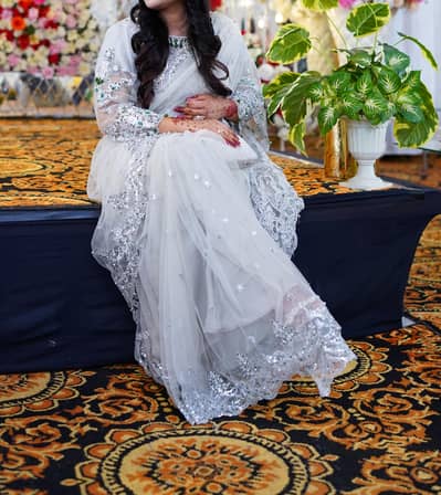 Handmade silver color 10/10condition saree available 1time used only