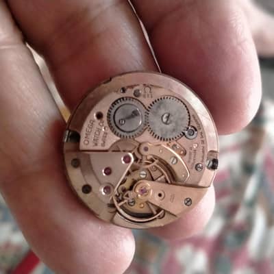 omega rare watch not working gold macaron