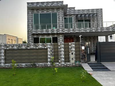 1 KANAL ELEGANT AND FULLY MAINTAINED SUPER HOT LOCATED BUNGALOW IS AVAILABLE IN THE BEST BLOCK OF DHA LAHORE