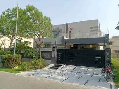1 KANAL ELEGANT AND FULLY MAINTAINED SUPER HOT LOCATED BUNGALOW WITH FULL BASEMENT NEAR SPORT COMPLEX IS AVAILABLE IN THE BEST BLOCK OF DHA LAHORE.