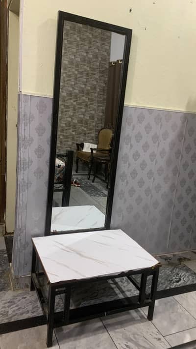 Mirror with a desk