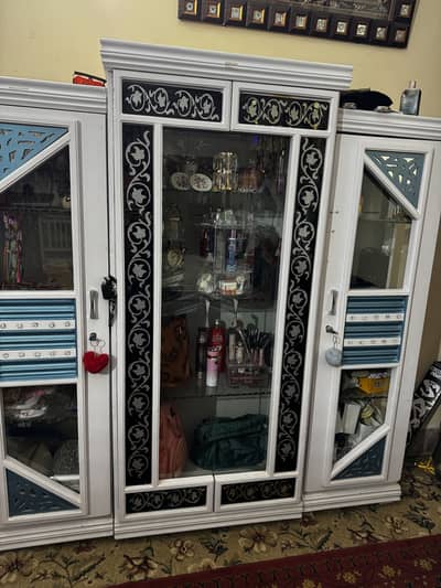 Bed with full set dressing table side tables divider and almari