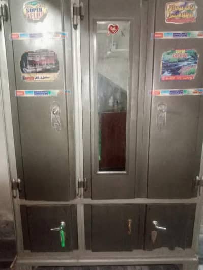 3 door  steal wardrobe.       table  Length: 4ft Width: 6ft Price :1