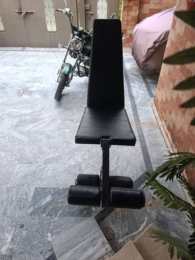 bench for chest shoulders and leg curls , front n back