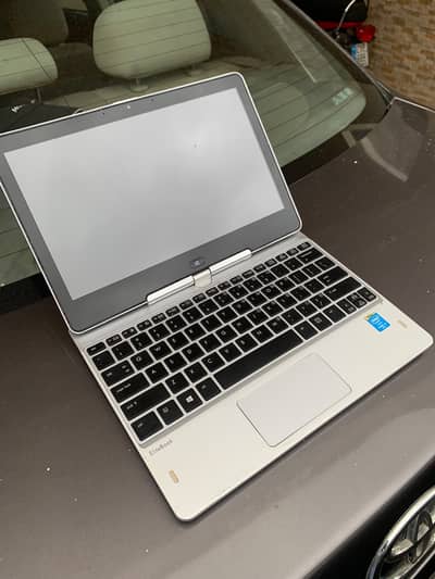 HP 810 Revolve. . . Touch Screen