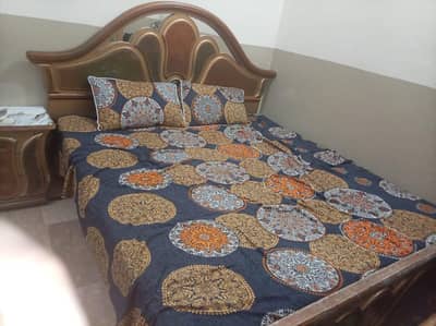 king size bed ,dressing, two side tables,and two tables