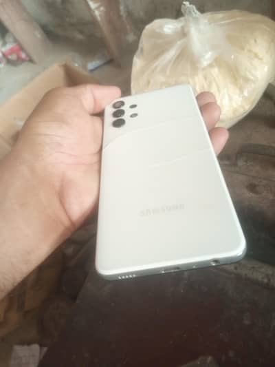 Samsung Mobile a32 pnil cheng back krackis 0303.71. 91.219