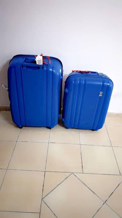 medium and large delsey paris suitcase original