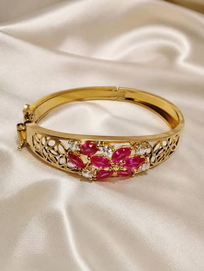 Elegent Gold plated bracelet with pink stones  and white crystals
