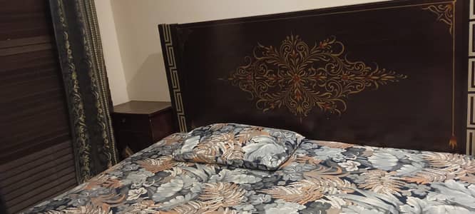 King Size bed with one side table