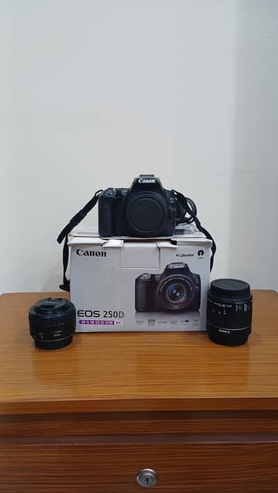 Canon EOS 250D/200D Mark ii + Canon EF 50mm f/1.8 + 18-55mm Kit Lens