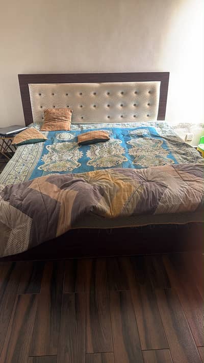 Used Double Bed with back cushion in good condition