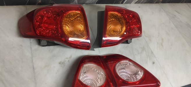 orignal Toyota Corolla back lights along with fog light covers