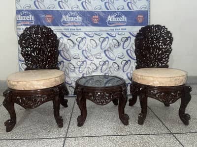 Chinoti chairs with center table