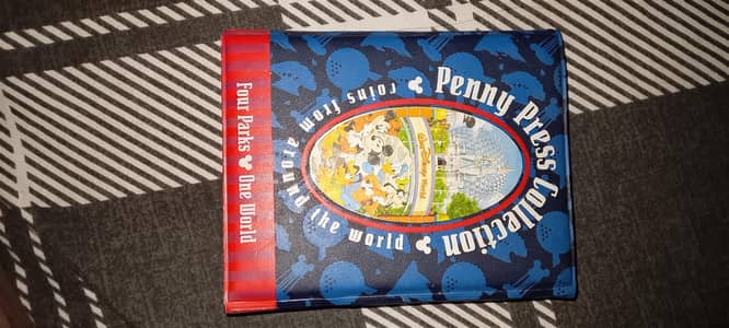 Disney world penny press collection Album + 23 coins - Four parks one