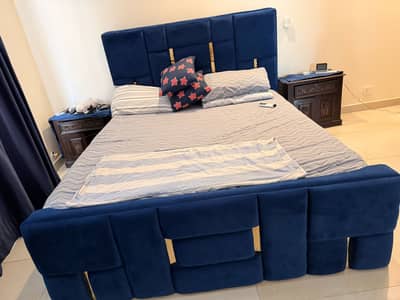 Wooden bed but covered with velvet