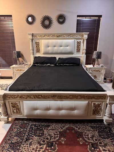 King size bed with side tables and dressing table