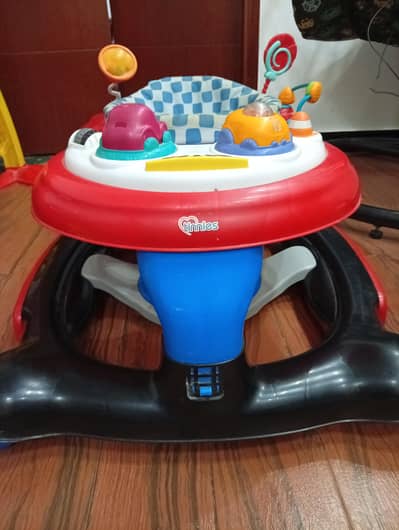 Baby walker with jumping function