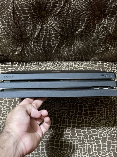 PlayStation 4 Pro 1TB with 2 Original Controllers For Sale