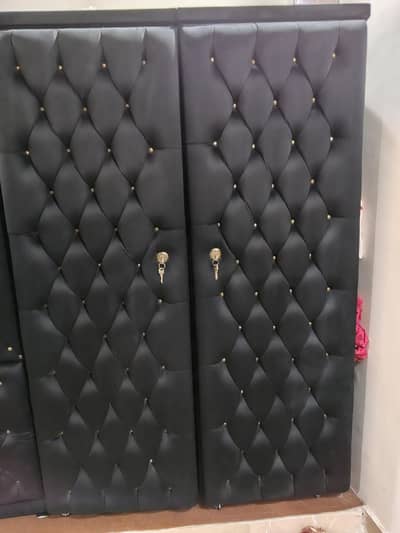 interwood black tafted wordrobe +croakery cabnet +excellent  condition