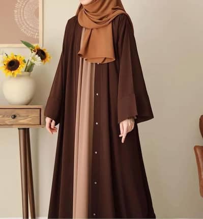 Women brown abaya with stoller