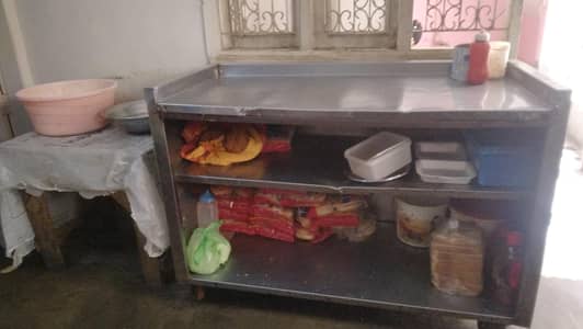 selling  chines stove working 3 tables 1 wood table
